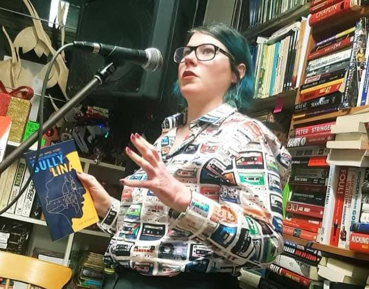 Reading from her own book