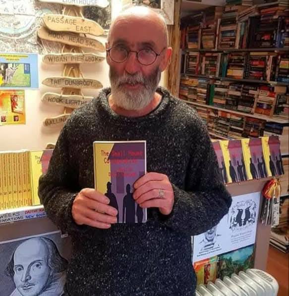 An author with his book
